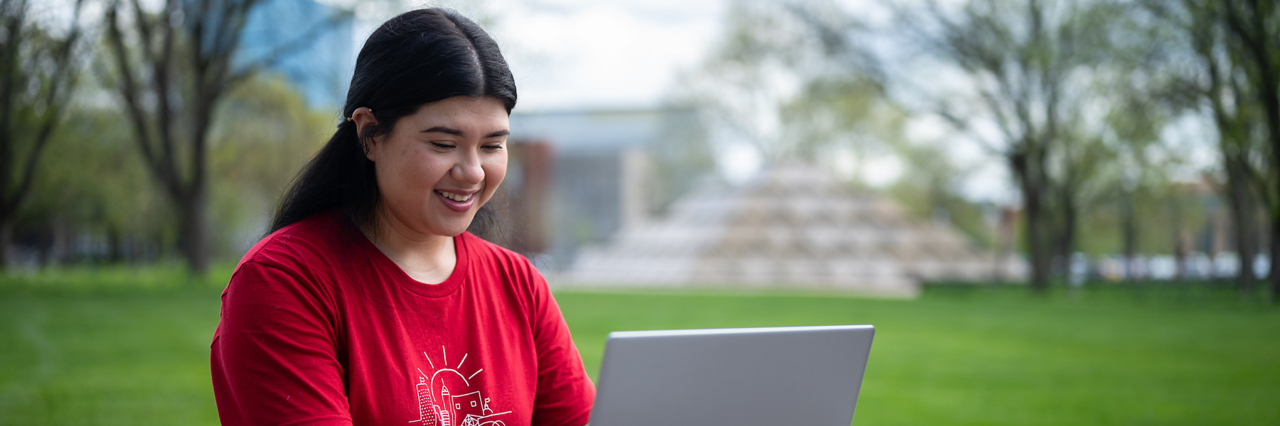 A woman on a laptop.